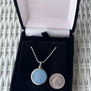 Never worn Saint Christopher enamel and Sterling silver metal with 16” chain.